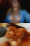 Mature women kissing other